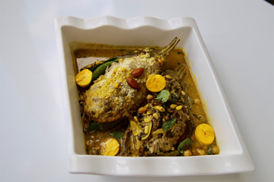 an image of a Sephardic  dish of eggplants stuffed with meat